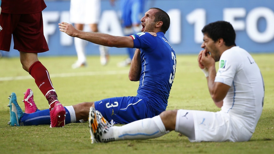 Luis Suarez Bite_Reuters.jpg